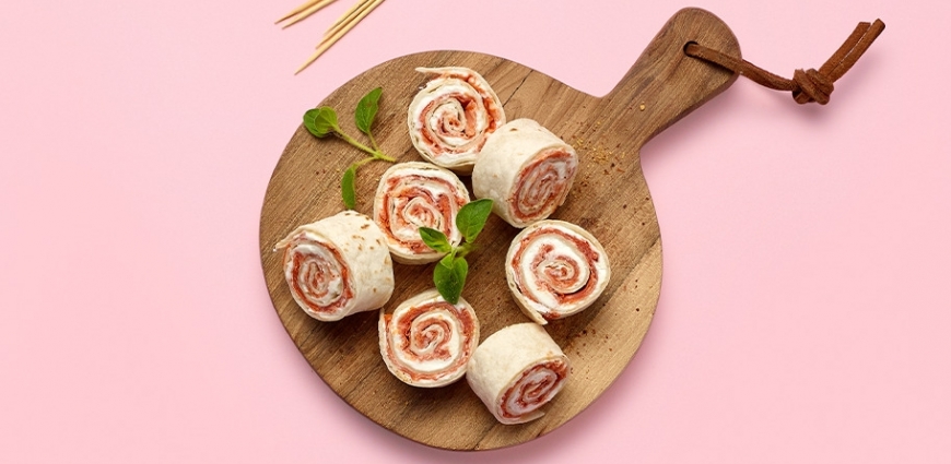 Rouleaux de spianata au fromage doux et à l’huile aromatisée d’ail